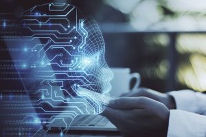 une personne sur un ordinateur avec un logo d'IA avec un visage